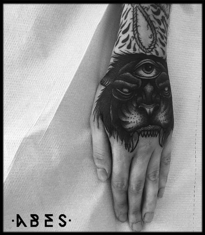 black panther tattoo hand